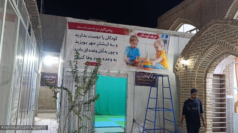 گزارش تصویری از آذین بندی خیابان برای مراسم توسط خادمان هیئت عقیله بنی هاشم سلام الله علیها